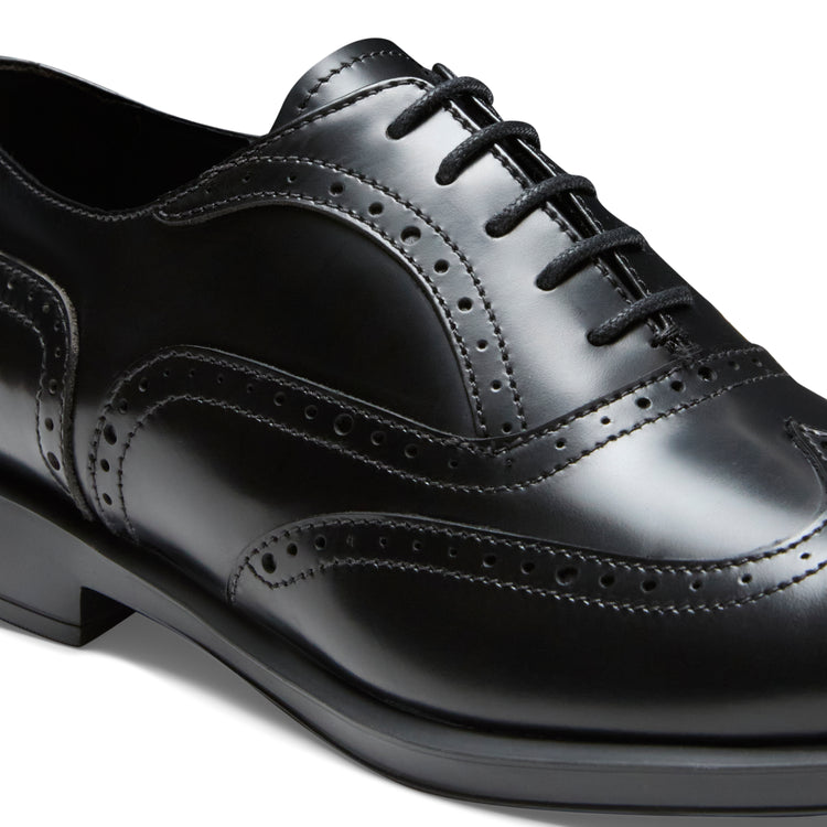 Damen-Oxfordschuh aus schwarzem Leder und Wildleder