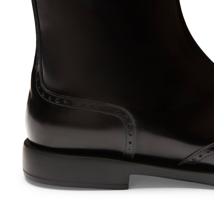 Brogue-Damenstiefelette aus schwarzem Leder