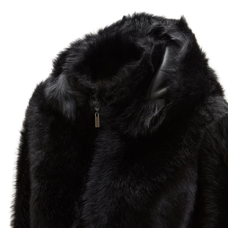Cappotto nero da donna in shearling reversibile a pelo lungo