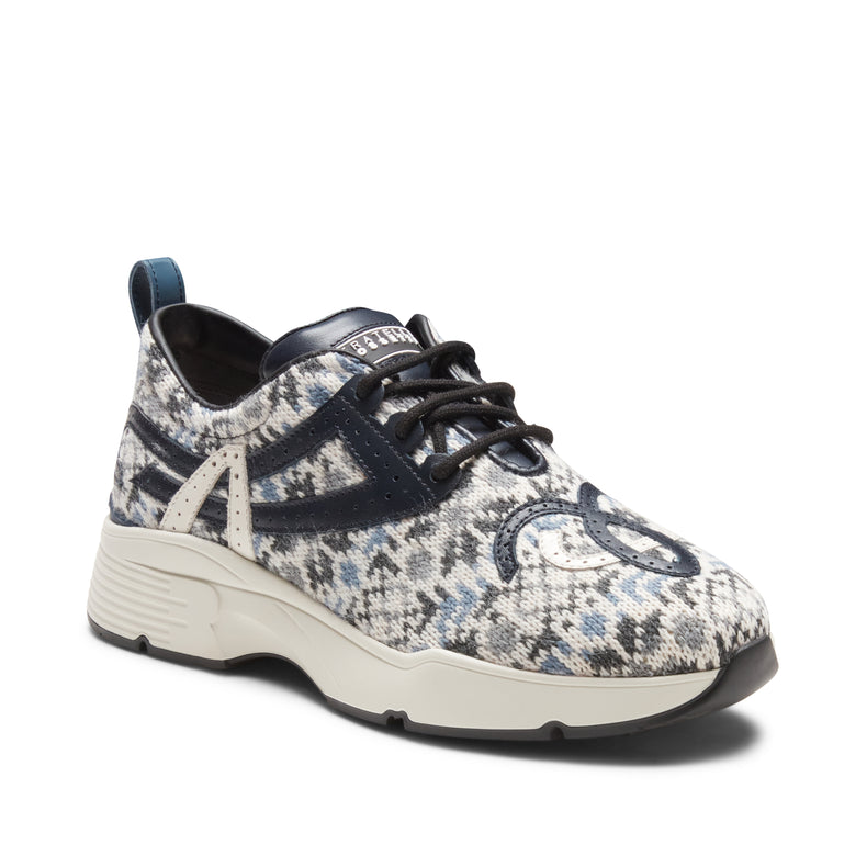 Sneaker in  pelle e tessuto fantasia