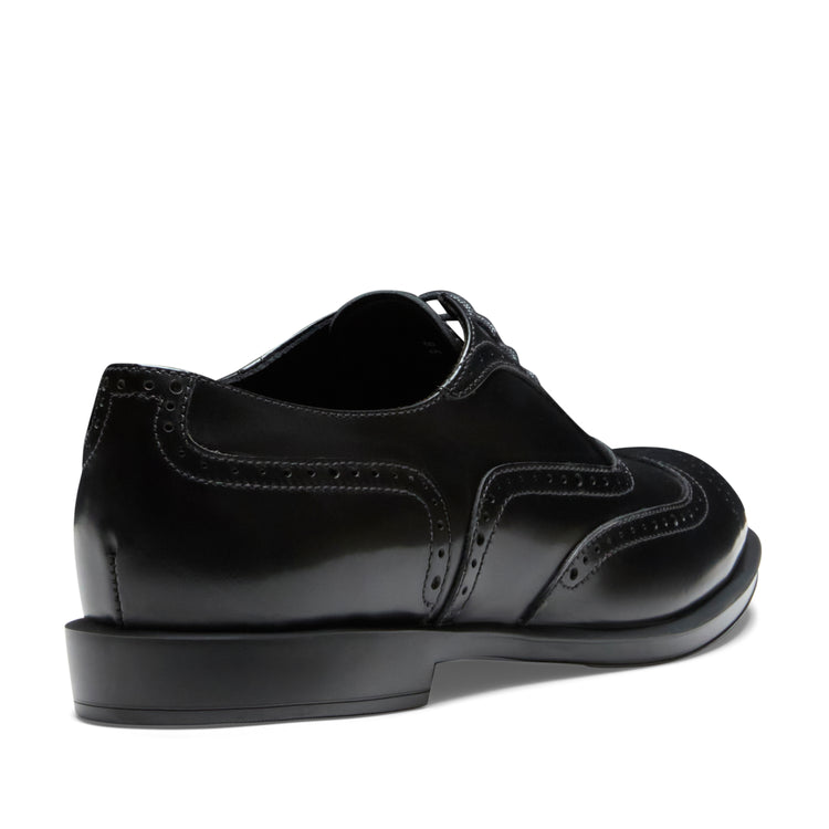 Damen-Oxfordschuh aus schwarzem Leder und Wildleder