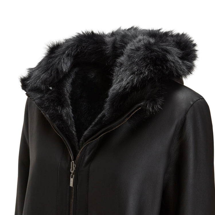 Cappotto nero da donna in shearling reversibile a pelo lungo