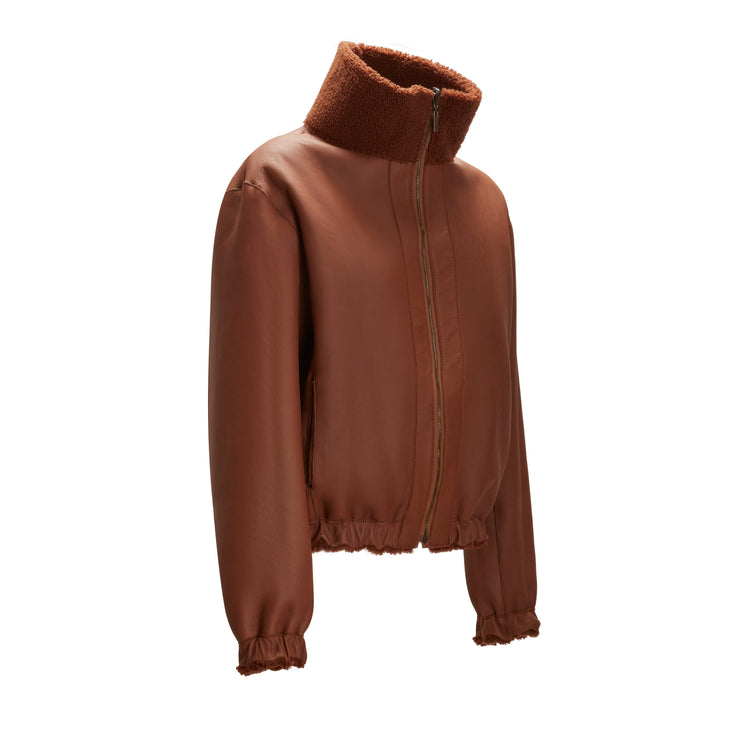 Bomber da donna in shearling reversibile biscotto